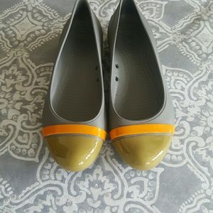 Pair cute Crocs shoes